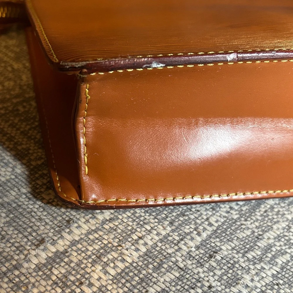 268. Louis Vuitton Epi Brown Pochette Homme